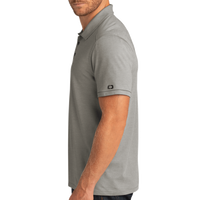 OGIO Code Stretch Polo, Tarmac Grey Heather, Left Sleeve view