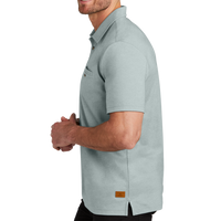 Travis Mathew Sunsetters Pocket Polo, Balsam Green Heather, Left Sleeve view